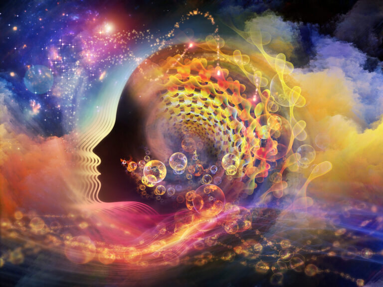 Digital art of a human profile dissolving into colorful clouds, stars and bubbles